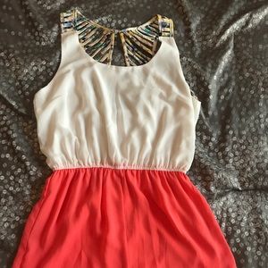 Boutique coral romper criss cross back